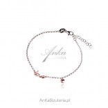 Silver bracelet with LOVE and pink gold plated heart