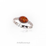 Silver ring with amber with hearts