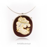 Silver pendant with carved KAMEA amber