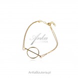 Silver bracelet, gold-plated circle with a baton