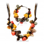 A set of jewelry with natural stones: amber, serpentine and coral