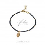 Gold-plated silver bracelet with black onyxes and a medallion