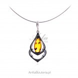 Silver oxidized pendant with amber