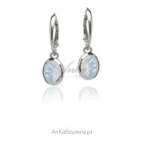 Silver earrings with faceted moonstone