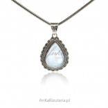 Silver pendant with a moonstone in a lace setting made of silver