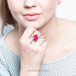 Large silver ring with a ruby