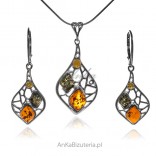 Silver jewelry with amber - a set of colored amber