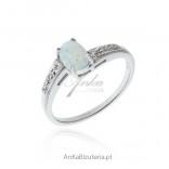 Silver ring with white opal and cubic zirconia