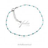 Silver bracelet with blue beads FOR THE LEG