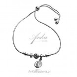 Silver pull bracelet with medallions and cubic zirconia