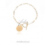 Gold-plated silver bracelet with a tibon and a circle