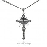 A large oxidized silver cross