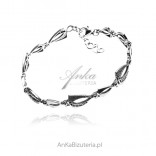 Silver bracelet with cubic zirconia triangles