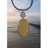 A beautiful silver necklace with yellow amber and rosette
