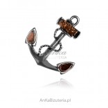 Silver brooch with ANCHOR amber