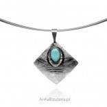 Silver pendant with satin blue turquoise
