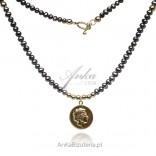 Gold-plated silver necklace with dark pearls and a medallion