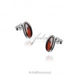 Subtle and elegant silver earrings with cherry amber
