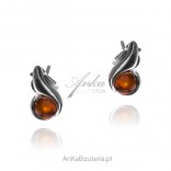 Subtle silver earrings with amber