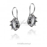 Silver earrings with azure zircon