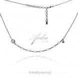 Silver necklace with white zircon - a combination of a fashionable rolo fleat chain with an anker