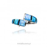Silver wedding ring with blue opal