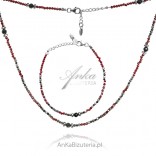 A set of silver jewelry with hematite and spinels