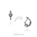 Silver earrings with a round zircon