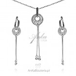 A set of silver jewelry with tiny cubic zirconia