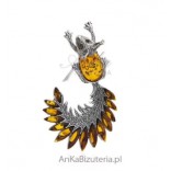 Silver brooch with squirrel amber