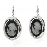 Silver KAMEA earrings with a hat on an English clasp