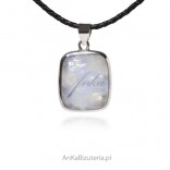 Silver jewelry pendant with a moonstone