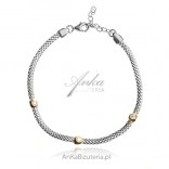 Silver and gold-plated CALZA bracelet with cubic zirconia