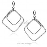Silver square earrings with notched elements