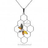 Silver pendant with amber Bee on a honeycomb