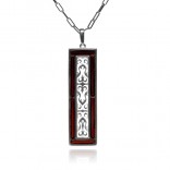 Silver pendant with cherry amber and openwork vertical ornament
