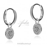 Silver hoop earrings with a pendant with a heart and cubic zirconia