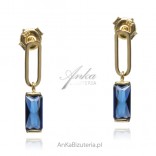 Gold-plated silver earrings with a blue zircon with a beautiful emerald cut