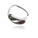 Silver ring with cognac and green amber