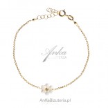 Gold-plated silver bracelet with a white flower