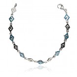 Silver bracelet with blue opal with a Greek pattern