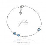 A delicate silver bracelet with blue opal SQUARES