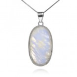 A large silver pendant with a moonstone