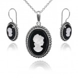 Set of silver cameo jewelry on black agate