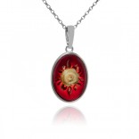 Silver pendant with hand-carved red amber