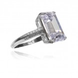 A silver ring with a large zircon with a beautiful emerald cut