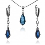 An elegant set of silver jewelry with a sapphire zircon