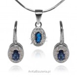 A subtle set of silver jewelery with white microcircon and sapphire zircon
