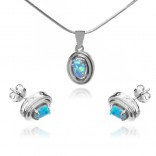 A set of silver jewelry with blue opal