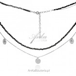 Silver necklace with black spinels and openwork charms